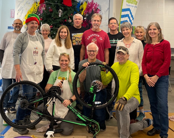 Elves from Bike Alpharetta made 277 bikes and scooters possible for Toyland in 2025